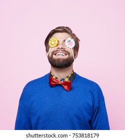 Eccentric Man Enjoying With Lollipop 