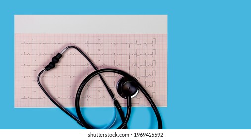 ECG 12 Lead Cardiogram With Stethoscope On  Blue Background, Panorama