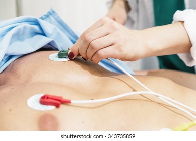ECG electrodes on the patient. In hospital