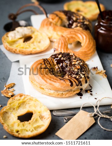 Similar – top view of assorted fresh tasty muffins