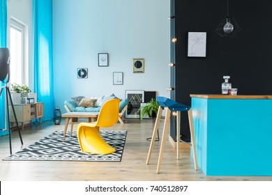 Eclectic Living Room Interior With Bar In Black And Blue