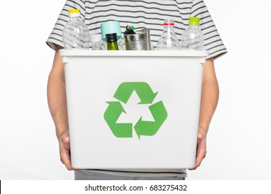 Eco Concept. Male Hands Holding Recycling Bin Full Of Recyclable Items Isolated On A White Background.