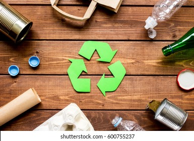 Eco concept with recycling symbol on table background top view - Shutterstock ID 600755237