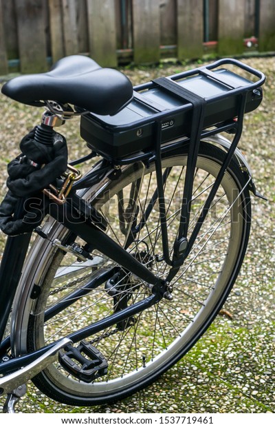 Eco electric bike, e-bike battery close up.\
No car transport\
alternative.