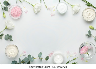 Eco frame of natural spa products on white background, copy space