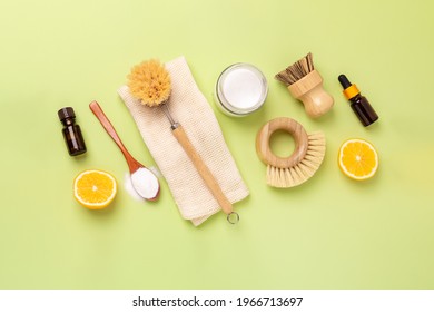 Eco Friendly Cleaning Products And Tools. Wooden Bamboo Brushes, Baking Soda, Lemon, Essential Oils. Top View - Image