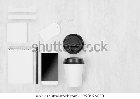 Similar – Business objects, cup of coffee, pen, phone and glasses.