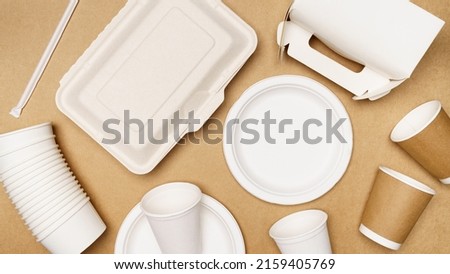 Eco friendly concept, Delivery food container and paper cup with straws on wooden background.