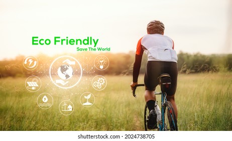 Eco Friendly Concept, Green Energy, Carbon Dioxide Reduction And Pollution Reduction. Car Free Day Concept To Save The World And Save The Earth. A Man Ride Bicycle In Midst Of Nature.