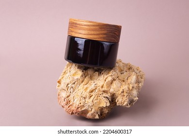 Eco Friendly Cream Container With Wooden Cover On The Natural Stones.Good As Cosmetics Mockup.