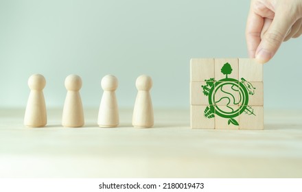 Eco Friendly, Green Company Culture Concept. Carbon Neutral And Net Zero Target. Sustainable Enviroment And Business Limit Global Warming. Build Green Community. Wooden Cubes With Eco Globe Icon.