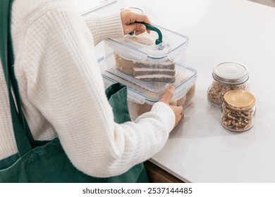 eco friendly habits hand gesture_using multiple container - Powered by Shutterstock