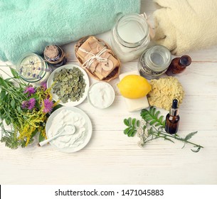 Eco Friendly Products For Cleaning And Care On Table. DIY Ingredients - Essential Oil, Salt, Bath Soap, Baking, Washing Soda, Vinegar, Lemon, Herbs. Zero Waste Detergent. Top View