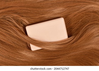 Eco Friendly Solid Shampoo Bar Surrounded By Healthy Brunette Hair