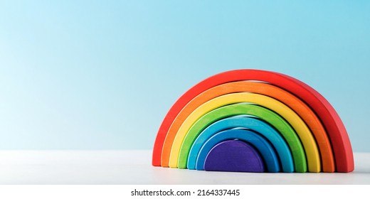 Eco Friendly Wooden Rainbow Toy For Early Childhood Development. The Concept Of A Children's Store Of Educational Toys.