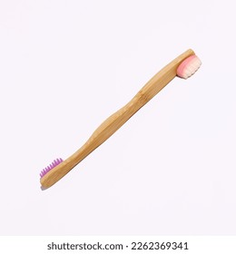 Eco friendly wooden tooth brush with gummy candy, teeth shape, creative dental care concept.  - Powered by Shutterstock