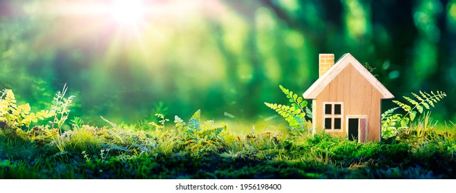 Eco House In Green Environment - Wooden Home Friendly On Grass