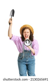 Eco News. Young Beautiful Girl, Female Gardener In Work Uniform And Hat Shouting At Megaphone Isolated On White Background. Concept Of Job, Emotions, Agronomy. Funny Meme Emotions. Copy Space For Ad