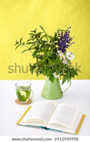 Similar – Image, Stock Photo Cup with yellow herbal tea