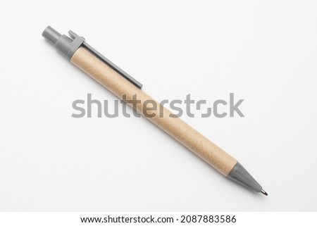 Eco pen made of paper isolated on white