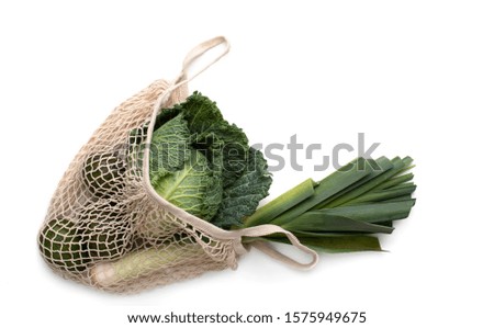 Similar – Ecological bag with vegetables on blue background