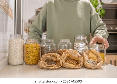 Eco-Conscious Individuals Store Bulk Foods In  Glass Jars. Enhance Your Kitchen Organization With Sustainable Solutions And Enjoy A Cleaner, Greener Living Space. - Powered by Shutterstock