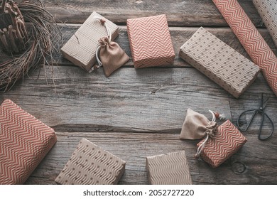 Eco-Friendly Christmas Gift Boxes In Corrugated Paper Reusable Paper On A Wooden Background. Zero Waste Environmentally Friendly Christmas Concept.High Quality Photo