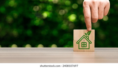 Eco-friendly houses prioritize sustainability. Utilize energy-efficient design, renewable energy sources, Green House, Concept the development of sustainable construction technologies and green living - Powered by Shutterstock