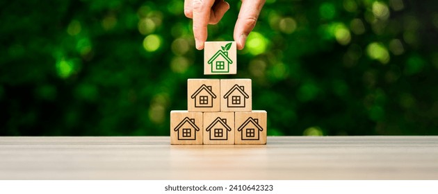 Eco-friendly houses prioritize sustainability. Utilize energy-efficient design, renewable energy sources, Green House, Concept the development of sustainable construction technologies and green living - Powered by Shutterstock