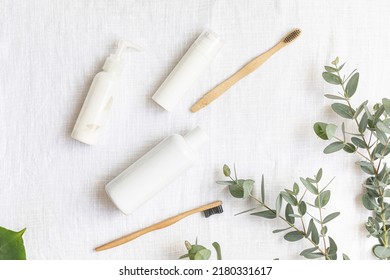 Eco-friendly morning accessories, towel, cream, mouthwash, toothbrush on a pastel background. Styled zero waste concept top view. - Shutterstock ID 2180331617
