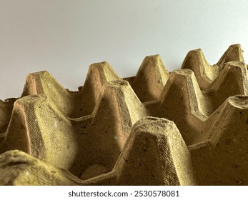 Eco-Friendly Recycled Cardboard Egg Carton Close-Up - Powered by Shutterstock