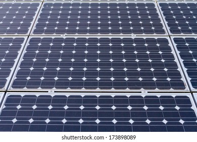 Eco-friendly solar panels photographed in color on a country property for energy generation and sustainable electricity production.