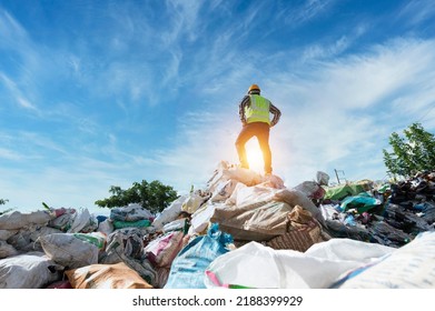 ecological engineering standing on the mountain rubbish big pile of garbage degraded waste A pile of bad smells and toxic residues. These wastes come from urban areas. industrial area
