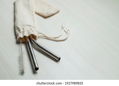 Ecological Stainless Steel Straw On The Kitchen Counter. With Copy Space. Ecology Concept. Reuse Concept.
