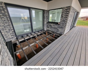 Ecological terrace made from wood plastic composite wpc under construction - Shutterstock ID 2252415047
