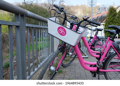 Ecological transport around the city without emissions. Bike sharing companies. Sports in the city. Pink bikes for community. European style of traveling. The future of public transportation in Prague