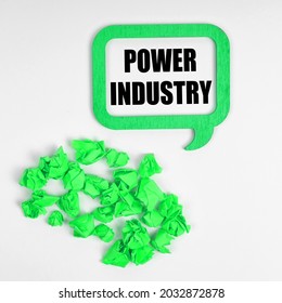 Ecology concept  On white background  green crumpled pieces paper   sign inside which the inscription   Power Industry