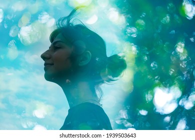 Ecology Image-Synthetic CG The Profile Of A Woman And Out-of-focus Forest