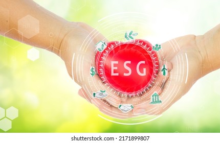 Ecology Protection - Hands Holding Red Heart With Lawn In Foreground, ESG Concept Of Environmental, Social And Governance, Charity And Donations