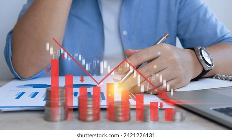 Economic collapse concept, businessman and Crisis chart with downwards arrow, financial problems, recession, debt, inflation, market collapse, financial crisis economic recession slowing down, etc.