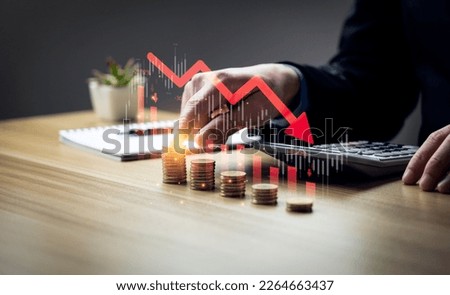 Economic collapse concept, businessman with falling financial graph chart due to global recession. Stock market crash, inflation, financial crisis, Falling income in GDP, capital reduction