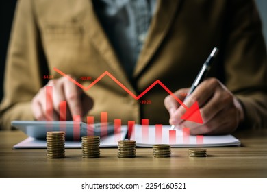 Economic crisis concept, businessman with falling financial graph chart due to global recession. Stock market crash, inflation, financial crisis, Falling income in GDP, capital reduction - Powered by Shutterstock