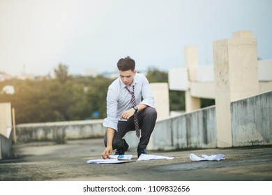 Economic crisis. Covid-19.
Young unemployed businessman.
Young businessmen desperate.
Businessman defeated. - Shutterstock ID 1109832656