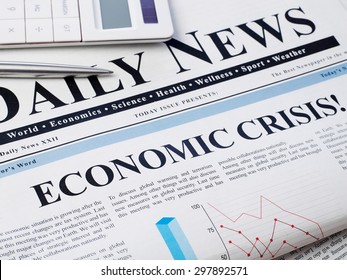 Economic crisis headline on newspaper