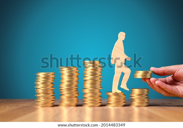 Economic\
growth stimulus in post-covid-19 era. Concept with coins, person\
rising on coins and helping hand with coins. Ppolitician stimulate\
economy for GDP growth in after covid-19\
crisis.
