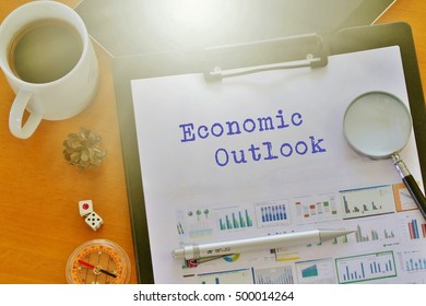 Economic Outlook - Text / Word  On The Paper 