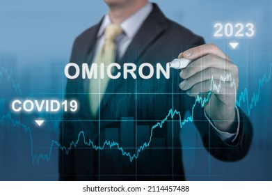 Economic Recovery In 2023. Economic Recovery After The Fall Due To The Covid 19 Omicron Coronavirus Pandemic. Businessman Pointing To The Graph Of Economic Recovery After Omicron Variant