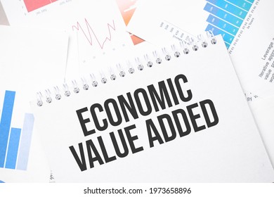 Economic Value Added Text On Paper On The Chart Background With Pen