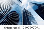 Economics, banking, business and finance concept.A fragment of a modern office building in the capital .glass buildings with cloudy blue sky background .modern office building
