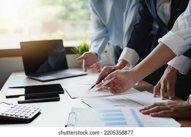 Economists give consultations to employees to increase their potential in using investment budget, planning marketing and assessing risks in investment budgets. - Shutterstock ID 2205358877